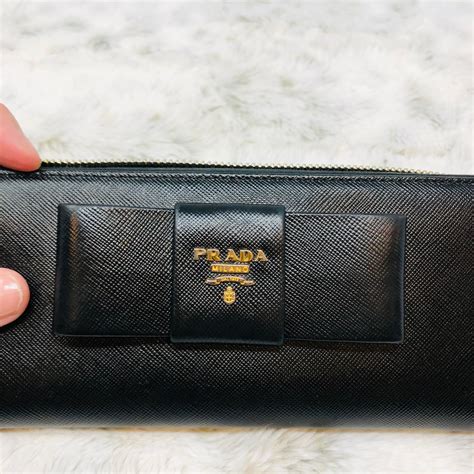 how much is a prada wallet worth|prada zipper wallet.